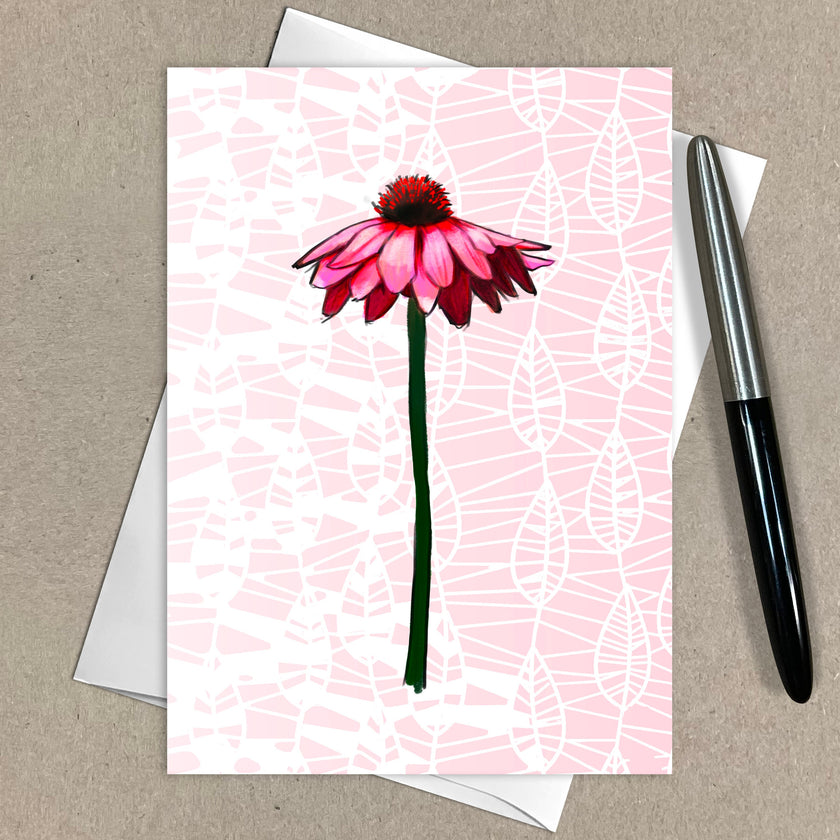 Greeting card with a pink flower design on a beige background