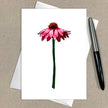 Greeting card with a pink flower illustration on a beige background