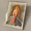 Card with a red cardinal bird design on a textured background