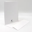 White greeting card with a visible brand logo on a white background