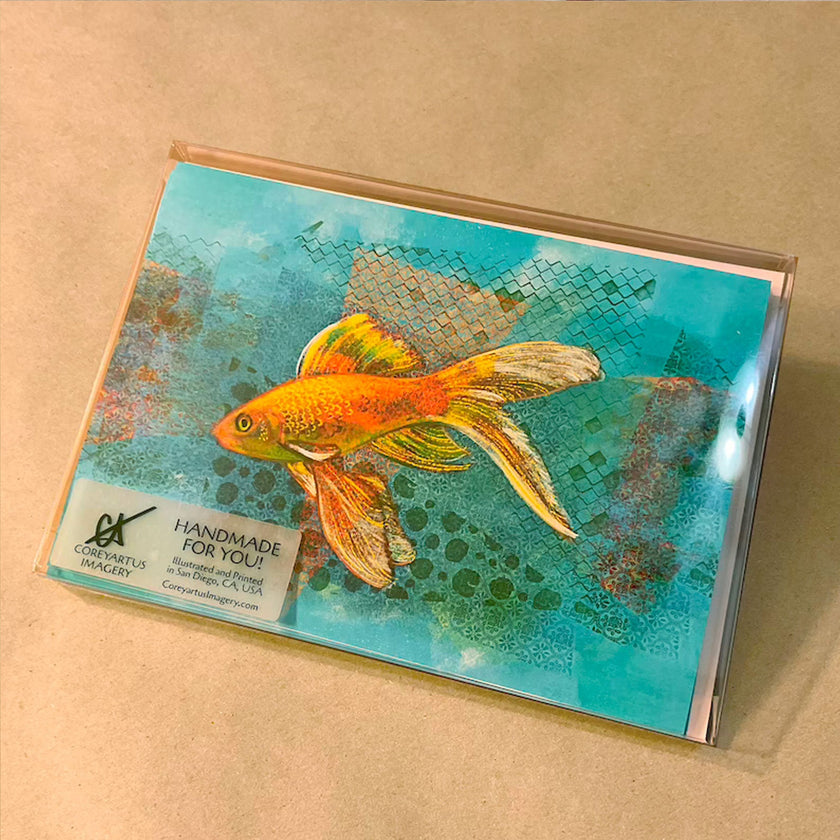 Boxed set of greeting card with a goldfish illustration on a textured background