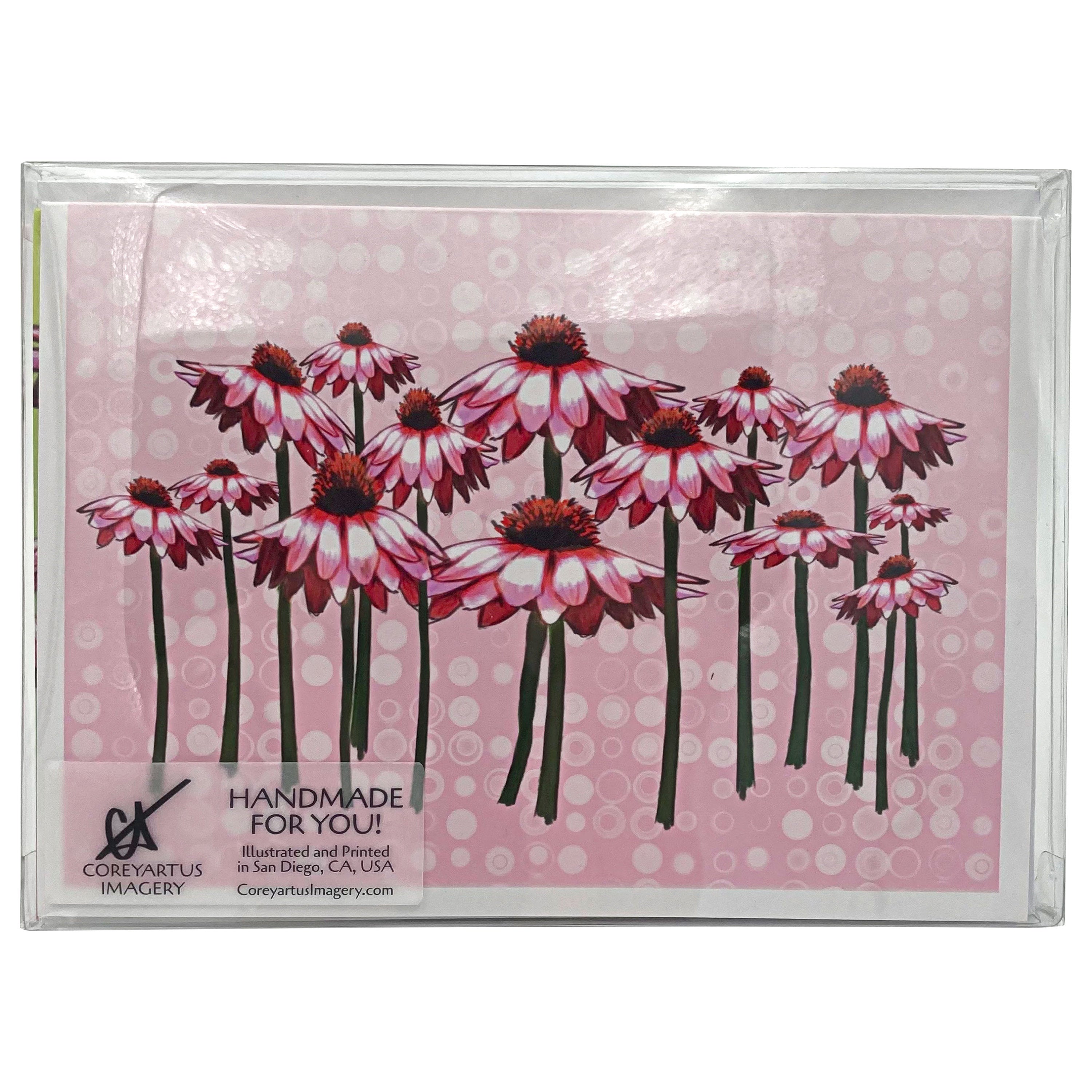 Card with pink and red floral design on a pink background, packaged in a clear case.