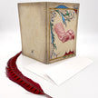 Decorative card with a hand illustration and a red feather on a white background