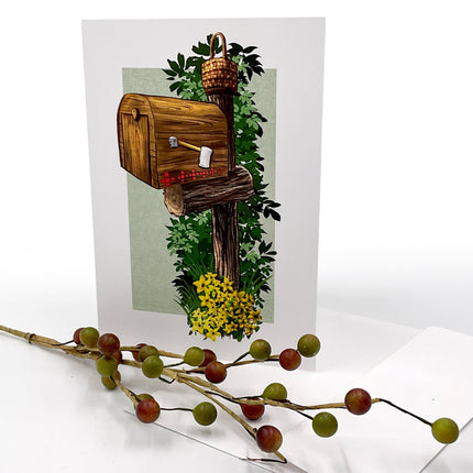 Greeting card with a wooden mailbox design on a white background