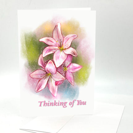 Greeting card with pink flowers and 'Thinking of You' text on a white background