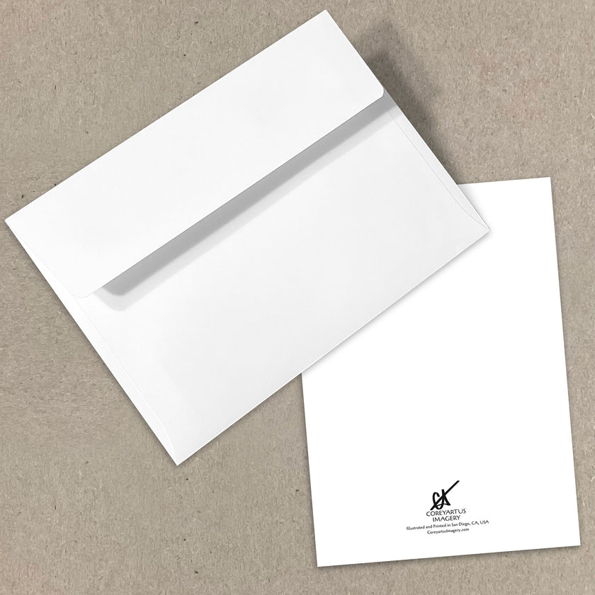 White envelope and card on a beige background