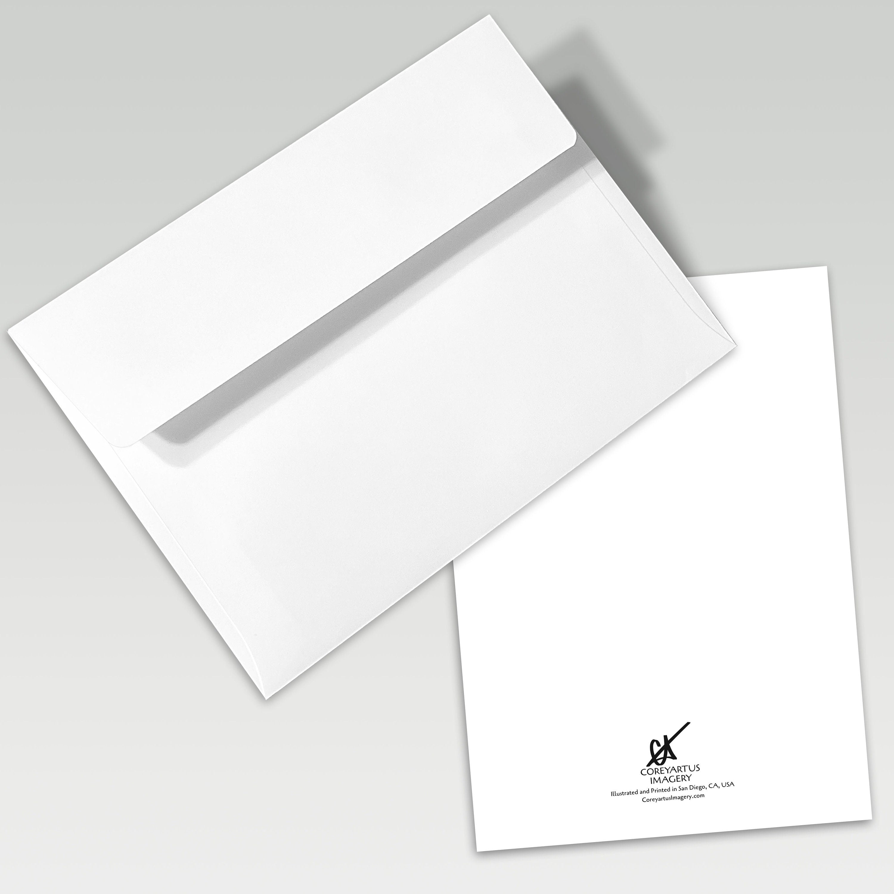 White envelope and card with a visible brand logo on a gray background