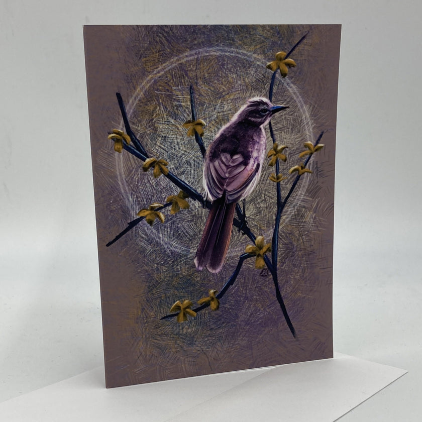 Greeting card with a bird and branch design on a white background