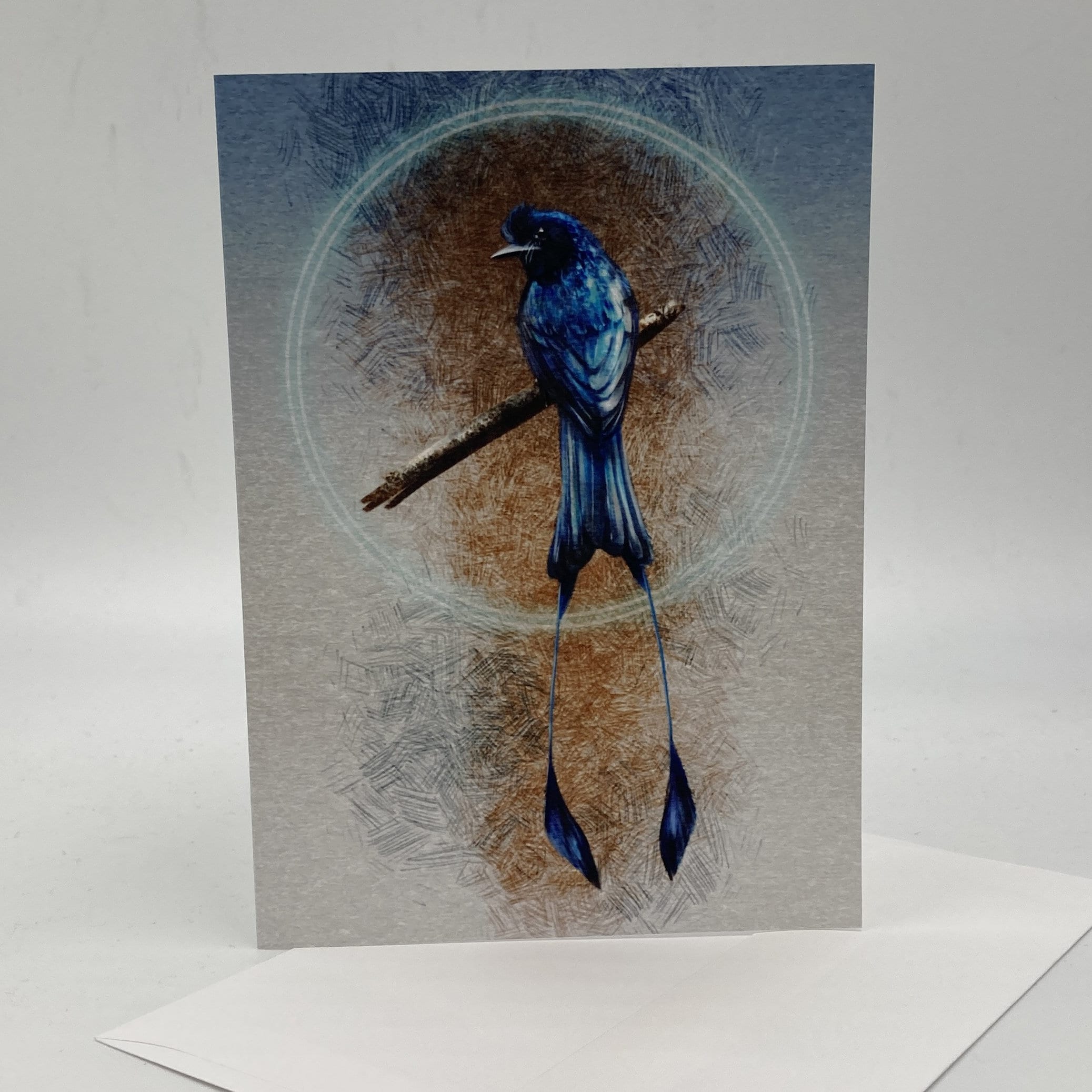 Greeting card with a blue bird illustration on a textured background