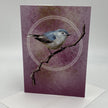 Greeting card with a bird illustration on a purple background