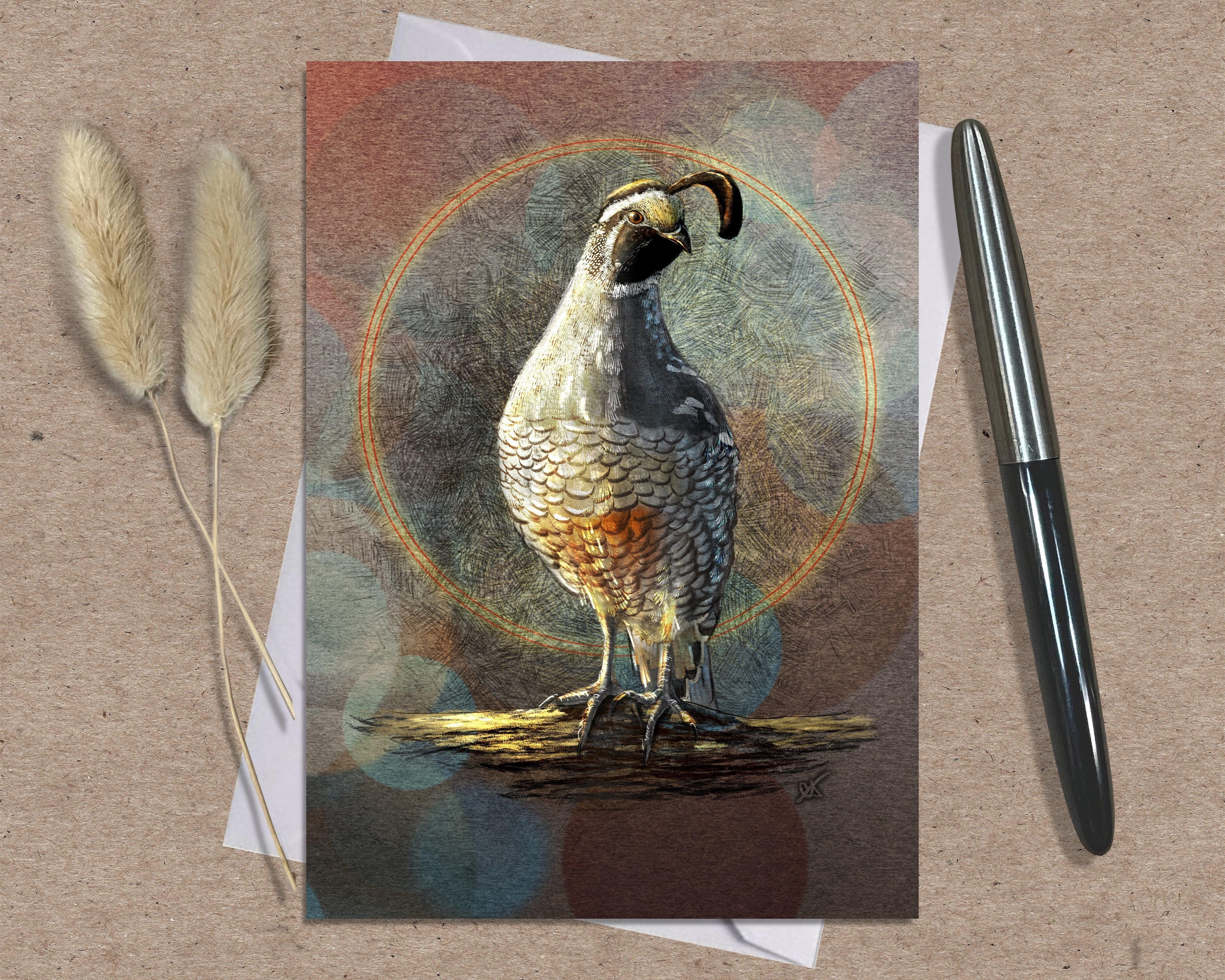 Card with a quail illustration on a textured surface with a pen and dried plants.