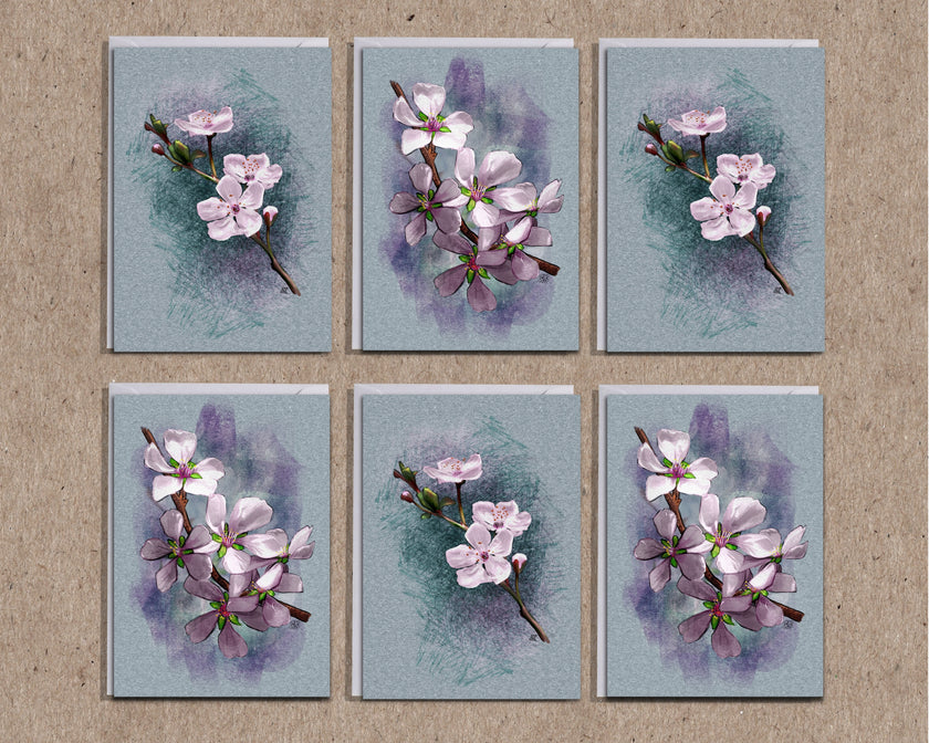 Set of six cards with floral designs on a textured beige background