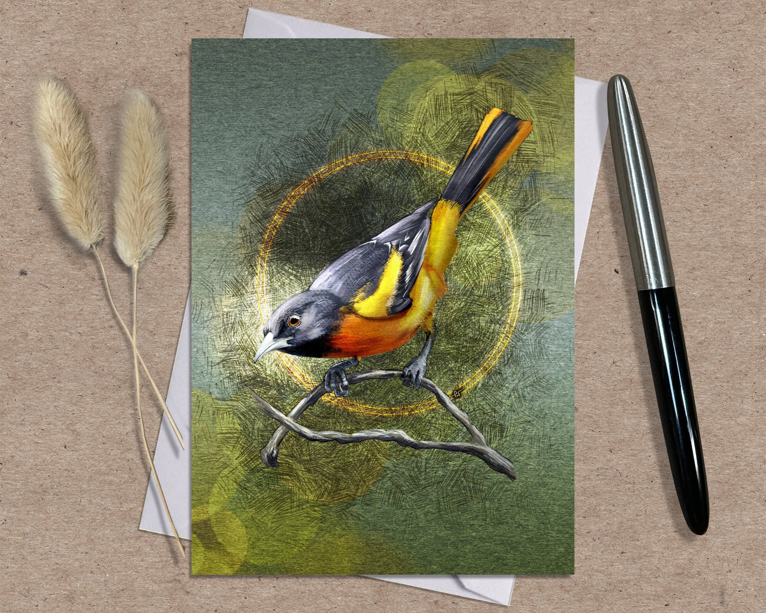 Greeting card with a bird illustration on a textured surface with a pen and dried plants.