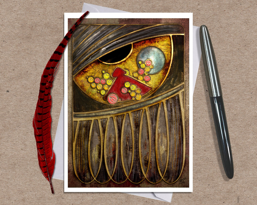 Greeting card with artistic design of an eye with the reflection of a person in a red cloak surrounded by flowers, accompanied by a pen and feather on a textured surface.