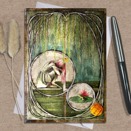 Decorative greeting card with nature-themed illustrations on a textured surface with a pen and dried plants.