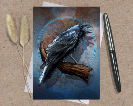 Greeting card with a bird illustration on a textured surface with a pen and dried plants.