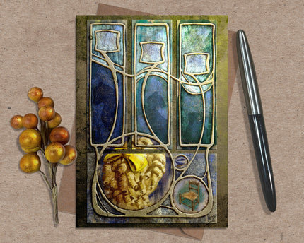 Decorative greeting card with abstract design, pen, and decorative branch on a textured surface
