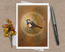 Greeting card with a bird illustration on a brown background, accompanied by a pen and decorative branch.