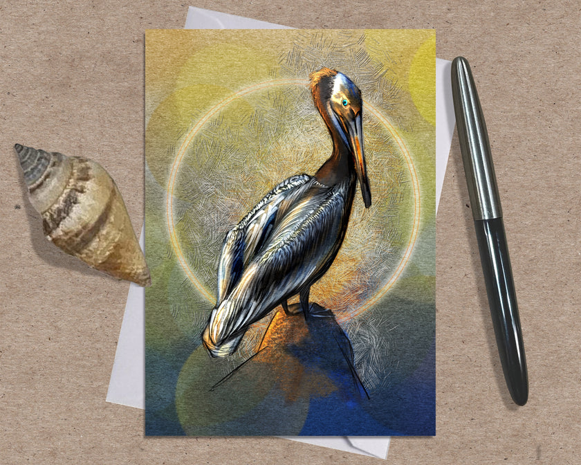 Card with a pelican illustration on a textured surface with a shell and pen.