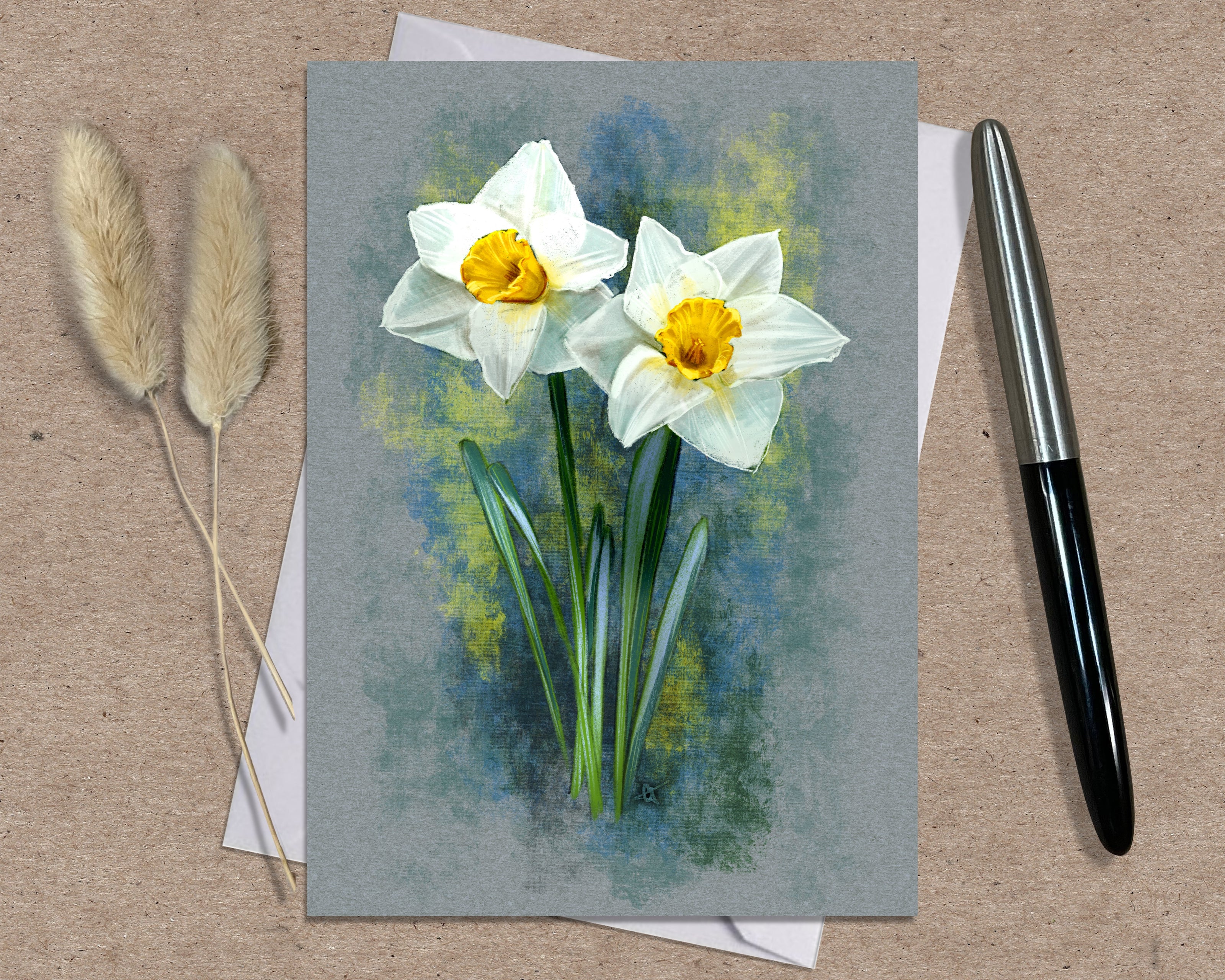 Greeting card with watercolor design of two white flowers with yellow centers on a textured surface.