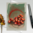 Greeting card with illustration of tomatoes on a textured background